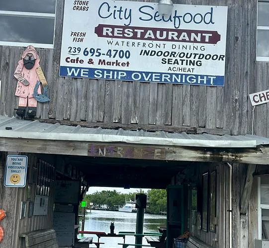 The City Seafood restaurant sign: waterfront dining, cafe and market, we ship overnight